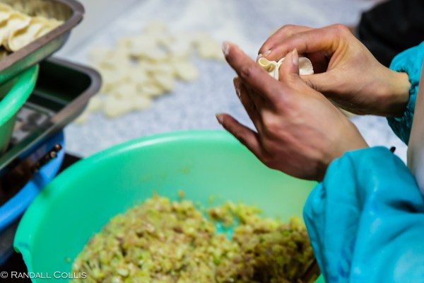 3.) Within that movement press and shape the jiao-zi...